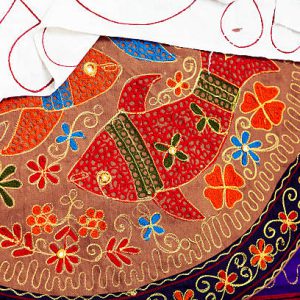 multicolor ethnic hand embroidery pattern on indian stile fabric